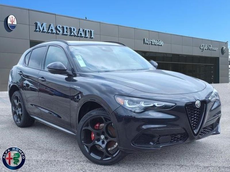 2024 Alfa Romeo Stelvio Veloce in a Vulcano Black Metallic exterior color and Blackinterior. Northside Imports Houston 281-475-4549 northsideimportshouston.com 