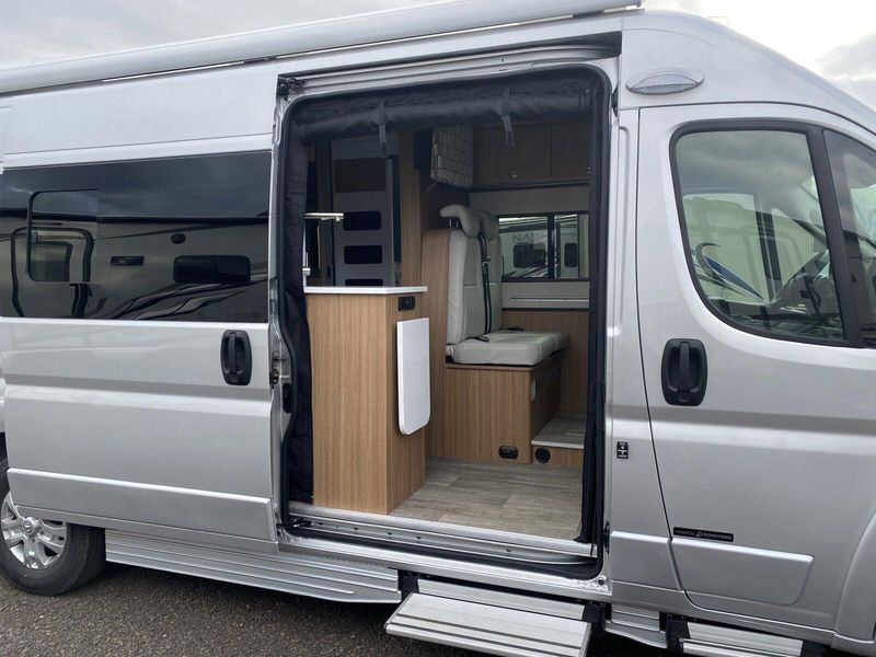 2024 ROADTREK Pivot  in a Silver Metallic exterior color and Chestnut Browninterior. Legacy Powersports 541-663-1111 legacypowersports.net 