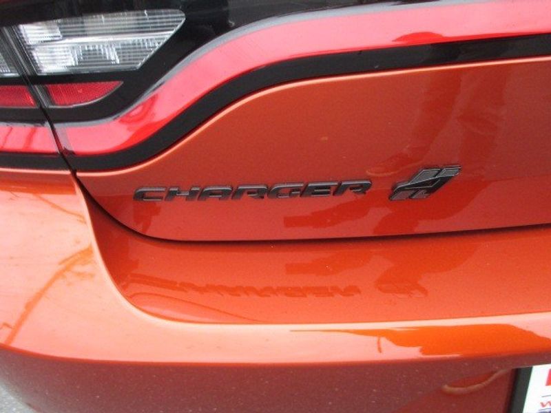 2023 Dodge Charger Gt Awd in a Sinamon Stick exterior color and Blackinterior. Oak Harbor Motors Inc. 360-323-6434 ohmotors.com 