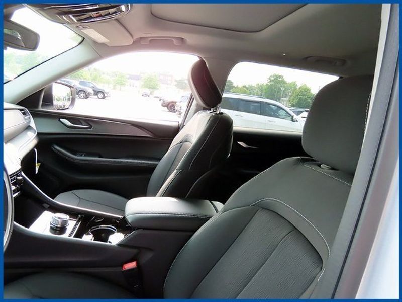 2023 Jeep Grand Cherokee Laredo in a Silver Zynith exterior color and Blackinterior. Papas Jeep Ram In New Britain, CT 860-356-0523 papasjeepram.com 