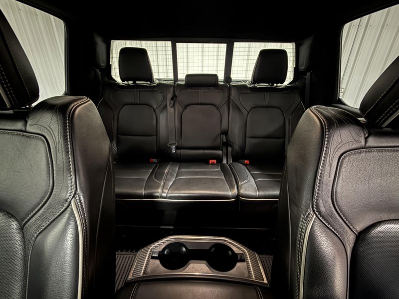 Used 2020 RAM 1500 Limited in a Ivory White Tri Coat Pearl Coat exterior color and Blackinterior. Thys Motor Company 319-318-6640 thysmotorco.com 