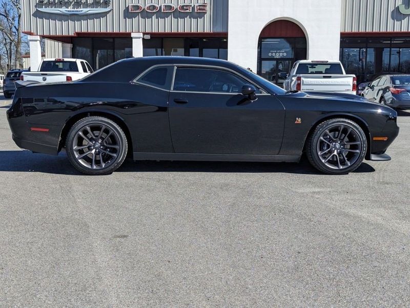 2023 Dodge Challenger R/T Scat Pack in a Pitch-Black exterior color and Blackinterior. Johnson Dodge 601-693-6343 pixelmotiondemo.com 