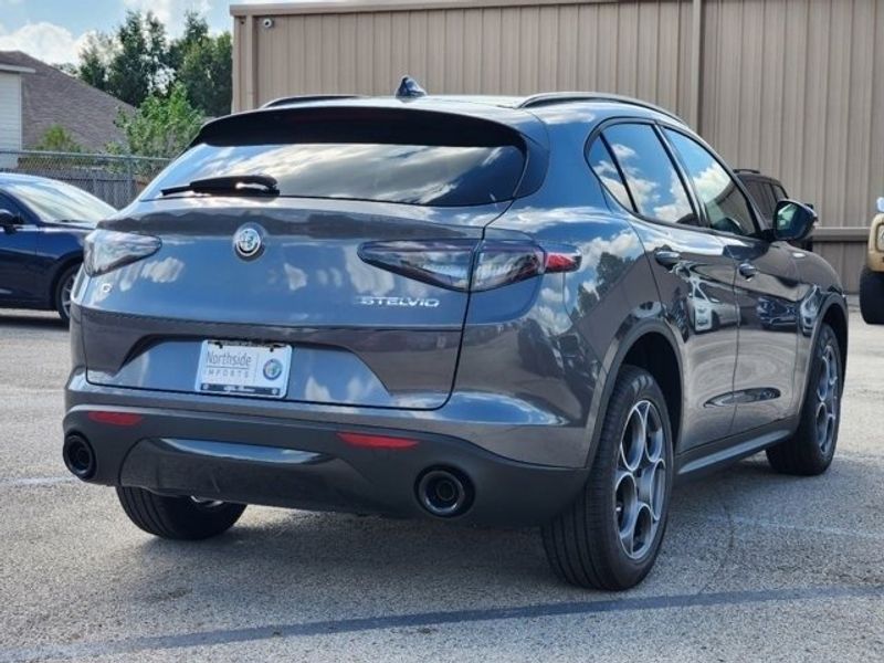 2024 Alfa Romeo Stelvio Sprint in a Vesuvio Gray Metallic exterior color and Blackinterior. Northside Imports Houston 281-475-4549 northsideimportshouston.com 