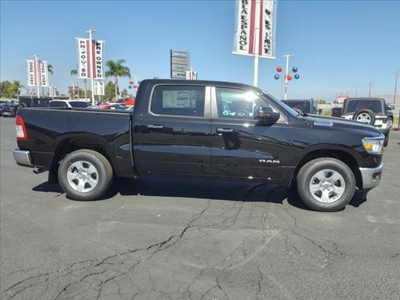 2024 RAM 1500 Big Horn Lone Star in a Diamond Black Crystal Pearl Coat exterior color and Blackinterior. Perris Valley Auto Center 951-657-6100 perrisvalleyautocenter.com 