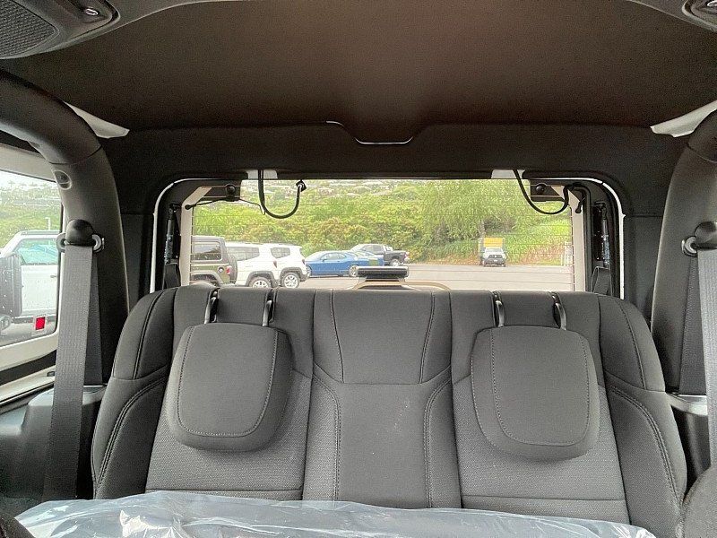 2023 Jeep Wrangler 2-door Sport S 4x4 in a Sting-Gray Clear Coat exterior color. Kona Auto Center 1-888-985-0772 konaautocenter.com 