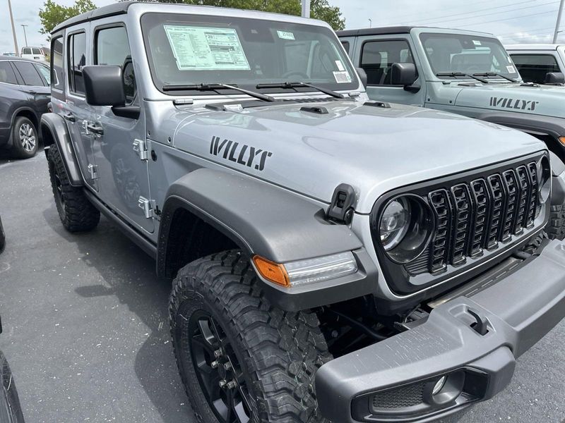 2024 Jeep Wrangler 4-door Willys in a Silver Zynith Clear Coat exterior color and Blackinterior. Gupton Motors Inc 615-384-2886 guptonmotors.com 