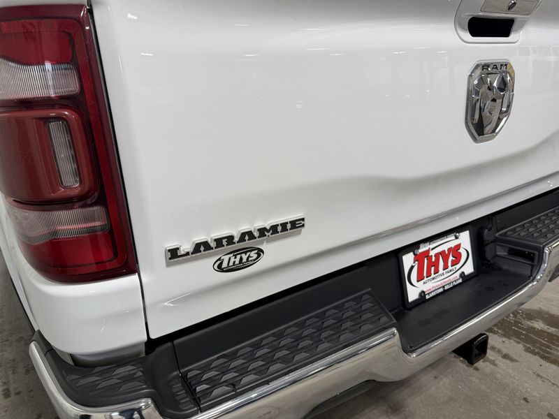 Used 2020 RAM 1500 Laramie in a Bright White Clear Coat exterior color and Blackinterior. Thys Motor Company 319-318-6640 thysmotorco.com 