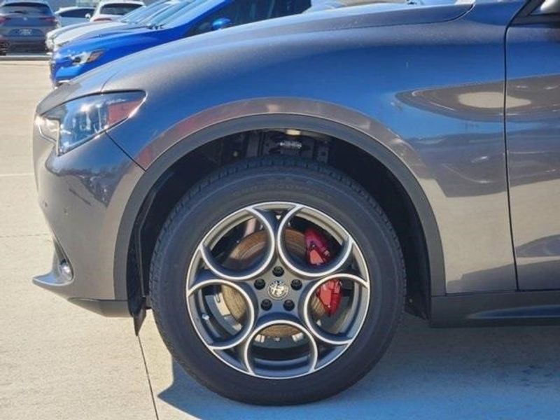 2024 Alfa Romeo Stelvio Sprint in a Vesuvio Gray Metallic exterior color and Blackinterior. Northside Imports Houston 281-475-4549 northsideimportshouston.com 