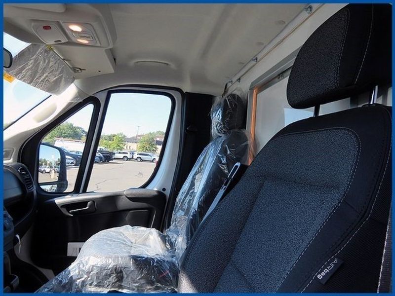 2023 RAM ProMaster Low Roof in a Bright White Clear Coat exterior color and Blackinterior. Papas Jeep Ram In New Britain, CT 860-356-0523 papasjeepram.com 