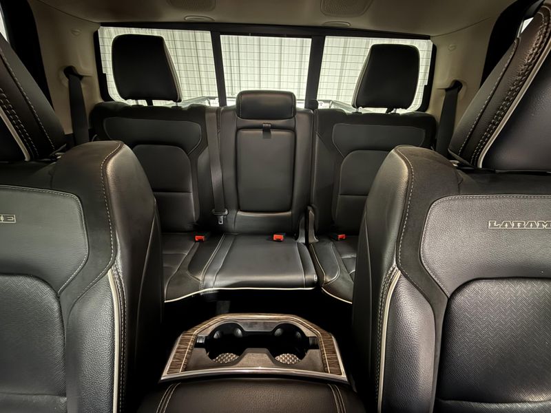 Used 2020 RAM 1500 Laramie in a Bright White Clear Coat exterior color and Blackinterior. Thys Motor Company 319-318-6640 thysmotorco.com 