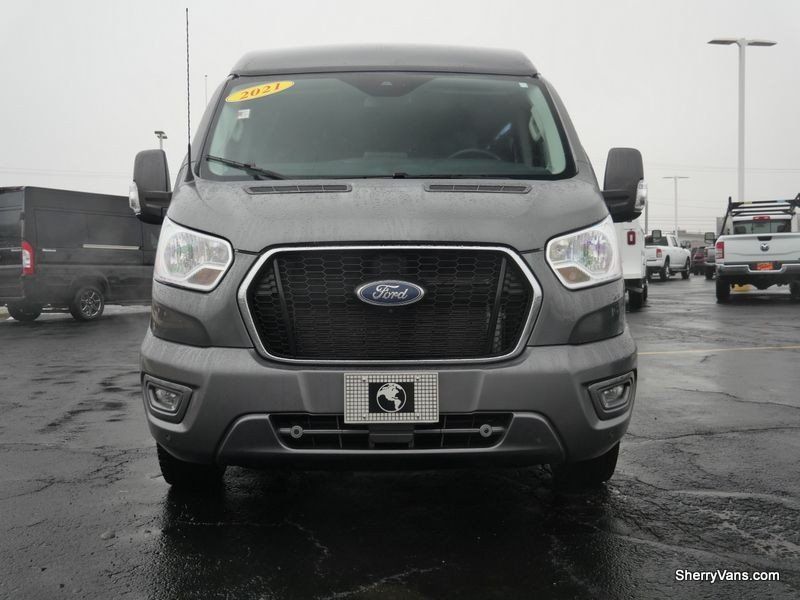 2021 Ford Transit-150 Cargo Van  in a Carbonized Gray Metallic exterior color and Graphiteinterior. Paul Sherry Chrysler Dodge Jeep RAM (937) 749-7061 sherrychrysler.net 