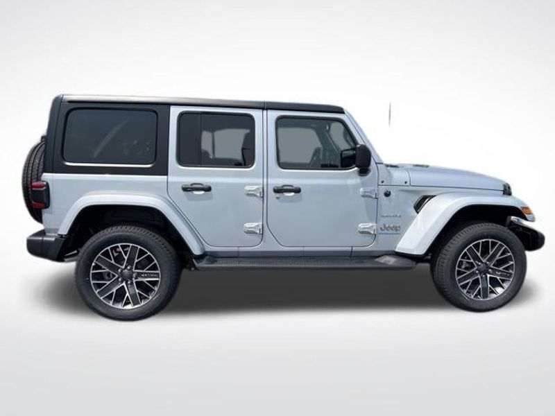 2023 Jeep Wrangler Sahara 4xe in a Silver Zynith Clear Coat exterior color and Blackinterior. Lakeshore CDJR Seaford 302-213-6058 lakeshorecdjr.com 