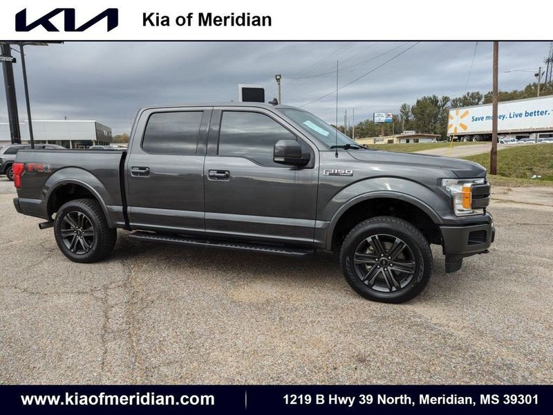 2020 Ford F-150 Lariat in a Magnetic Metallic exterior color and Blackinterior. Johnson Dodge 601-693-6343 pixelmotiondemo.com 