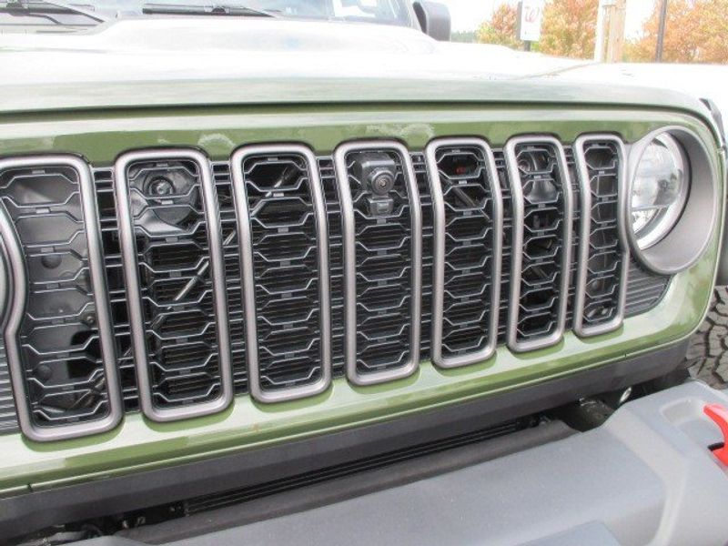 2024 Jeep Wrangler 4-door Rubicon in a Sarge Green Clear Coat exterior color and Blackinterior. Oak Harbor Motors Inc. 360-323-6434 ohmotors.com 