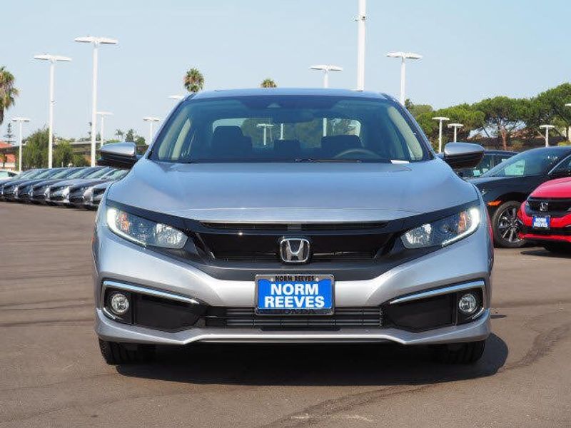 2020 Honda Civic Sedan EX in a Lunar Silver Metallic exterior color and Blackinterior. BEACH BLVD OF CARS beachblvdofcars.com 
