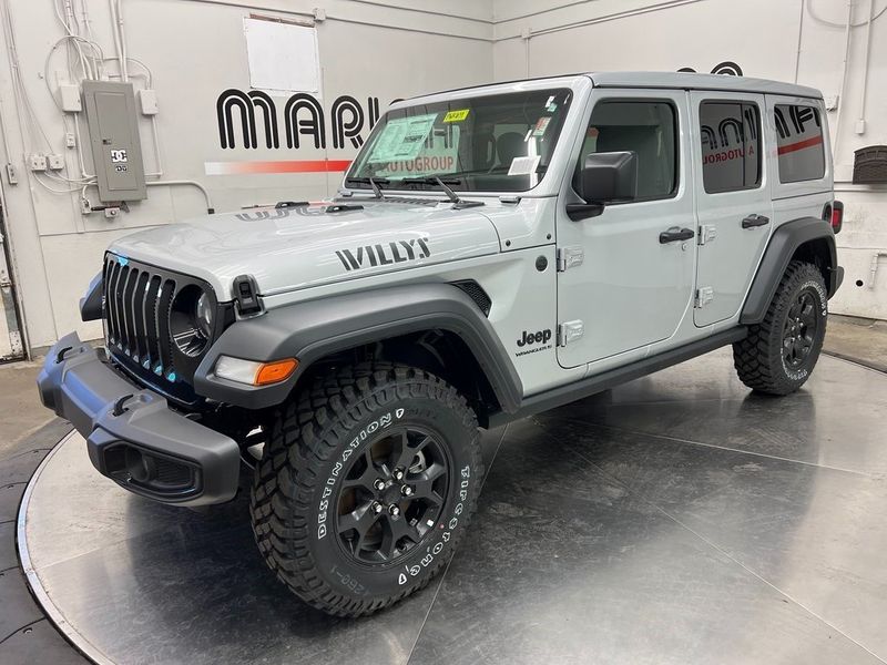 2023 Jeep Wrangler 4-door Willys 4x4 in a Silver Zynith Clear Coat exterior color and Blackinterior. Marina Auto Group (855) 564-8688 marinaautogroup.com 
