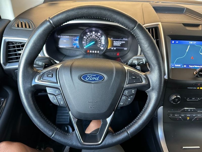 2020 Ford Edge SEL in a Agate Black exterior color and Ebonyinterior. Marina Chrysler Dodge Jeep RAM (855) 616-8084 marinadodgeny.com 