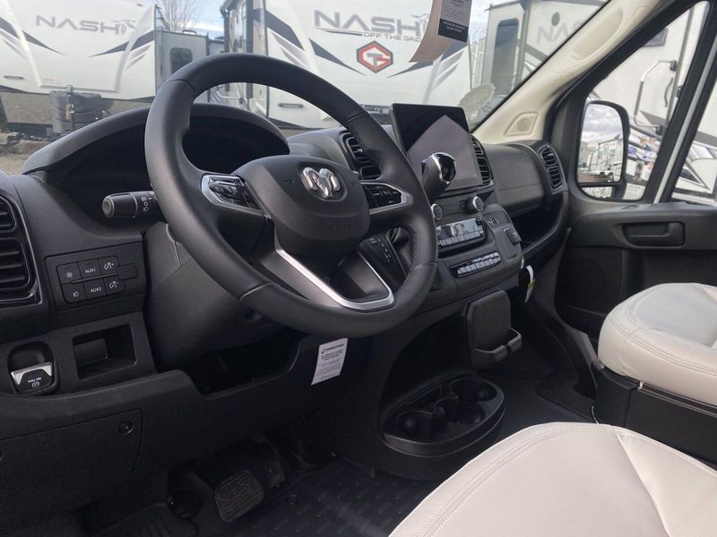 2024 ROADTREK Pivot  in a Silver Metallic exterior color and Chestnut Browninterior. Legacy Powersports 541-663-1111 legacypowersports.net 
