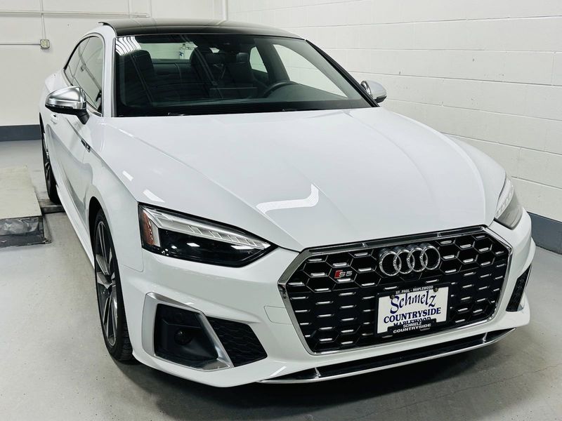 2022 Audi S5 Coupe Premium Plus AWD w/Nav in a Glacier White Metallic exterior color and Black Heated Leatherinterior. Schmelz Countryside SAAB (888) 558-1064 stpaulsaab.com 