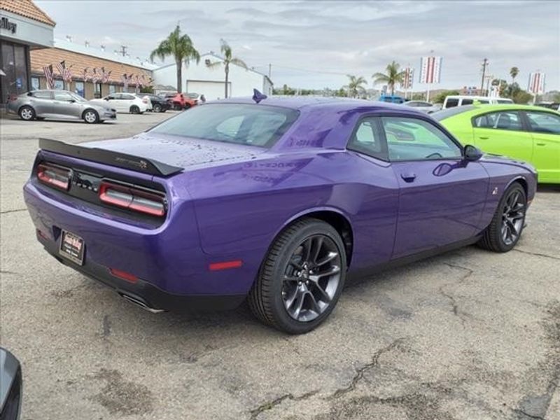 2023 Dodge Challenger R/T Scat Pack in a Plum Crazy exterior color and Blackinterior. Perris Valley Chrysler Dodge Jeep Ram 951-355-1970 perrisvalleydodgejeepchrysler.com 