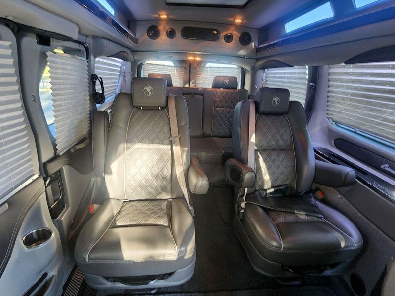 2021 Ford Transit-150 Cargo Van  in a Carbonized Gray Metallic exterior color and Graphiteinterior. Paul Sherry Chrysler Dodge Jeep RAM (937) 749-7061 sherrychrysler.net 