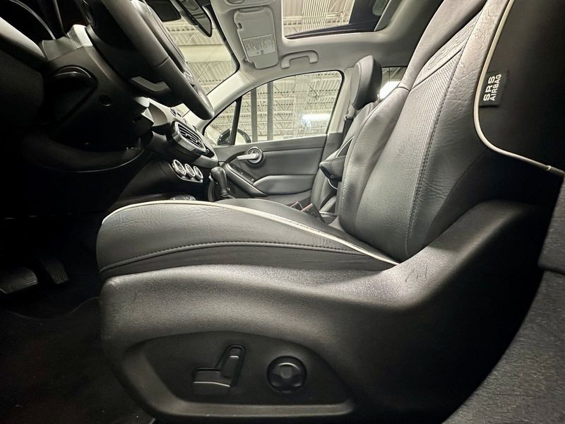 2022 Fiat 500X Trekking AWD w/Sunroof/Nav/Driver Asst in a Bianco Gelato (White Clear Coat) exterior color and Black Heated Leatherinterior. Schmelz Countryside Alfa Romeo and Fiat (651) 968-0556 schmelzfiat.com 