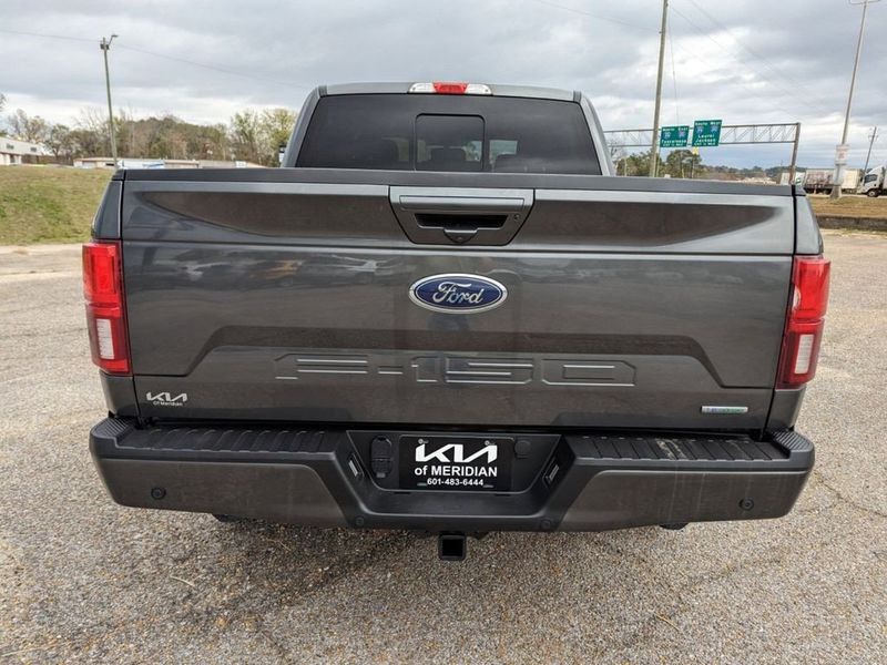 2020 Ford F-150 Lariat in a Magnetic Metallic exterior color and Blackinterior. Johnson Dodge 601-693-6343 pixelmotiondemo.com 