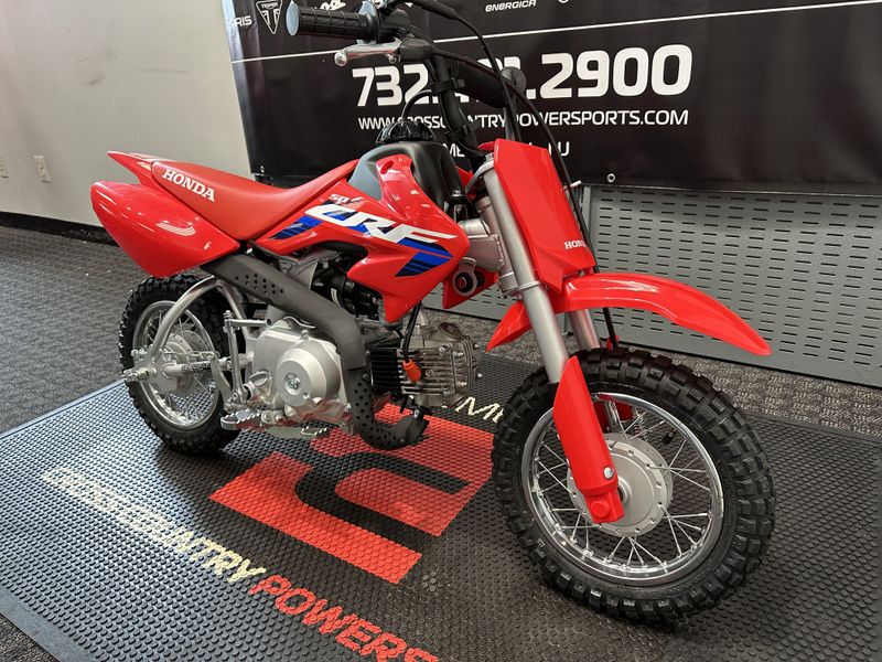 2024 Honda CRF50F in a RED exterior color. Cross Country Powersports 732-491-2900 crosscountrypowersports.com 