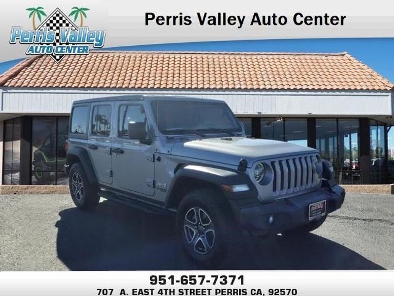 2020 Jeep Wrangler Unlimited Sport S in a Billet Silver Metallic Clear Coat exterior color and Blackinterior. Perris Valley Kia 951-657-6100 perrisvalleykia.com 