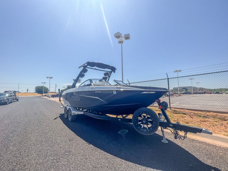 2019 MALIBU WAKESETTER 25 LSV  in a BLACK exterior color. Family PowerSports (877) 886-1997 familypowersports.com 