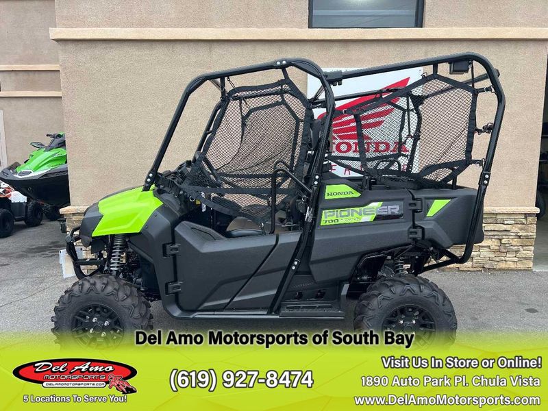 2024 Honda SXS700M4DLR  in a KRYPTON GREEN exterior color. Del Amo Motorsports of South Bay (619) 547-1937 delamomotorsports.com 