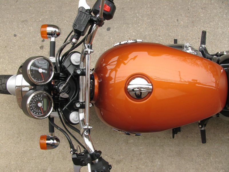 2023 Royal Enfield INT 650   in a Orange Crush exterior color. Motoworks Chicago 312-738-4269 motoworkschicago.com 