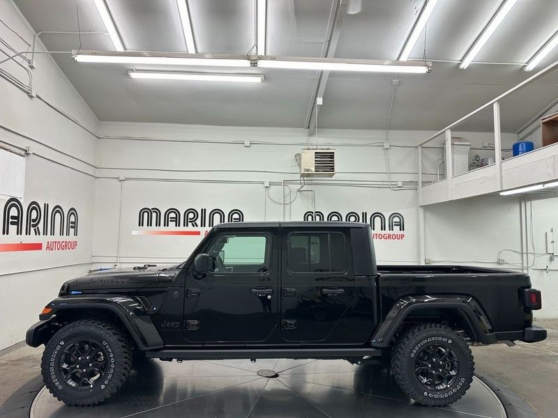 2023 Jeep Gladiator Willys 4x4 in a Black Clear Coat exterior color and Blackinterior. Marina Chrysler Dodge Jeep RAM (855) 616-8084 marinadodgeny.com 
