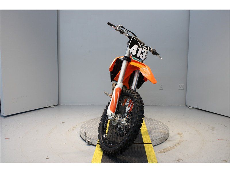 2018 KTM SX 450 F in a Orange exterior color. New England Powersports 978 338-8990 pixelmotiondemo.com 