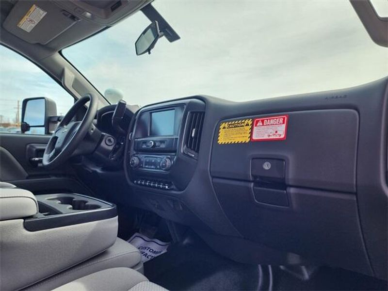 2023 Chevrolet Silverado 4500HD Work Truck in a Red exterior color and Dark Ash Seats With Jet Black Interior Accentsinterior. Raymond Auto Group 888-703-9950 raymonddeals.com 