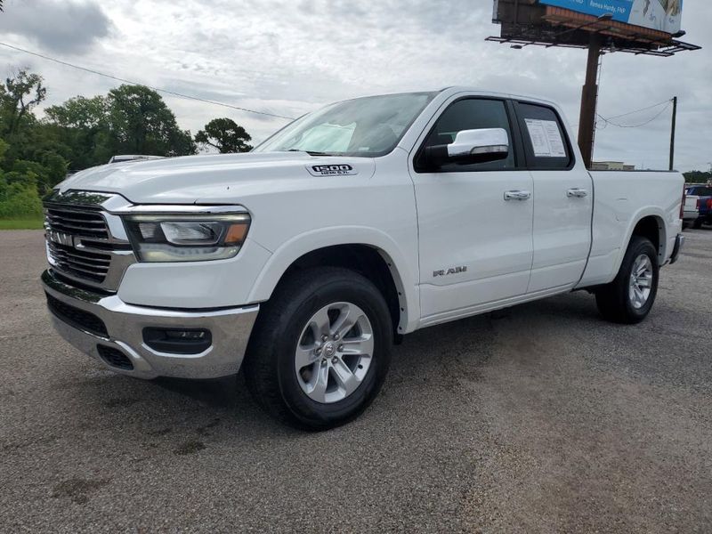 2020 RAM 1500 Laramie in a Bright White Clear Coat exterior color and Blackinterior. Johnson Dodge 601-693-6343 pixelmotiondemo.com 