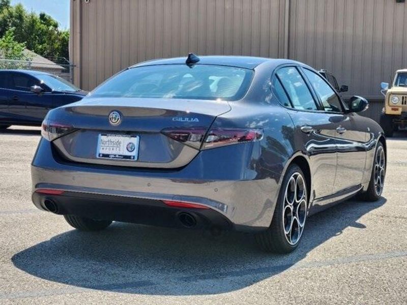 2024 Alfa Romeo Giulia Ti in a Vesuvio Gray Metallic exterior color and Blackinterior. Northside Imports Houston 281-475-4549 northsideimportshouston.com 