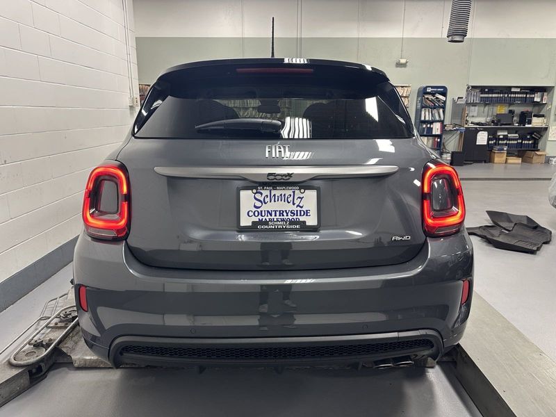 2023 Fiat 500x Sport Awd in a Grigio Moda (Graphite Gray Metallic) exterior color. Schmelz Countryside Alfa Romeo and Fiat (651) 968-0556 schmelzfiat.com 