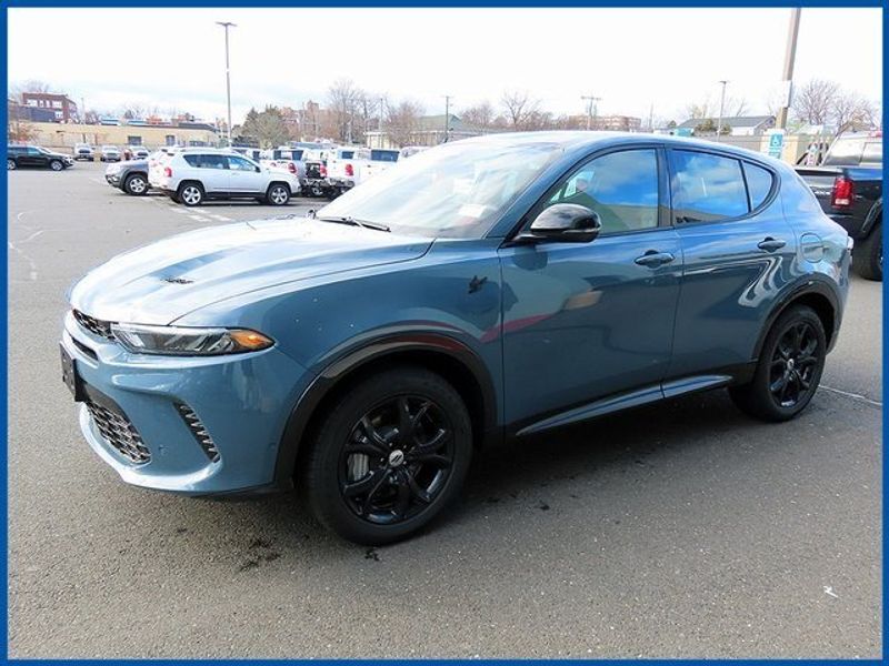 2024 Dodge Hornet R/T Plus in a Blue Steele exterior color and Blackinterior. Papas Jeep Ram In New Britain, CT 860-356-0523 papasjeepram.com 