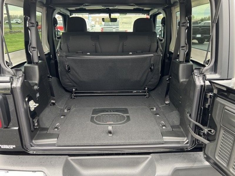 2023 Jeep Wrangler 2-door Sport S 4x4 in a Black Clear Coat exterior color and Blackinterior. Lakeshore CDJR Seaford 302-213-6058 lakeshorecdjr.com 