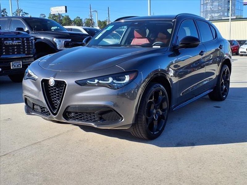 2024 Alfa Romeo Stelvio Veloce in a Vesuvio Gray Metallic exterior color and Blackinterior. Northside Imports Houston 281-475-4549 northsideimportshouston.com 