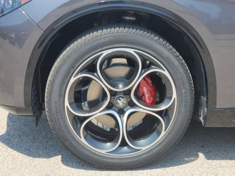 2024 Alfa Romeo Stelvio Veloce in a Vesuvio Gray Metallic exterior color and Blackinterior. Northside Imports Houston 281-475-4549 northsideimportshouston.com 