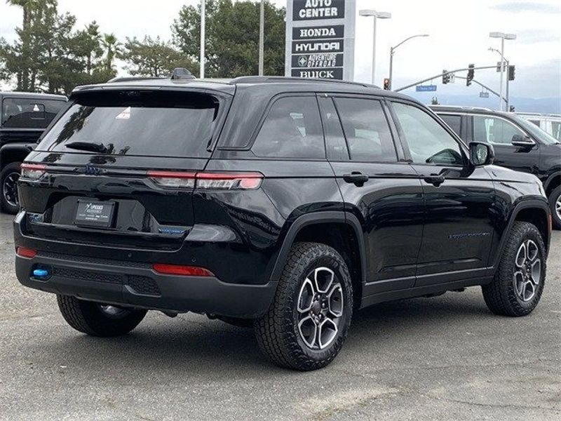 2023 Jeep Grand Cherokee Trailhawk 4xe in a Diamond Black Crystal Pearl Coat exterior color and Global Blackinterior. McPeek