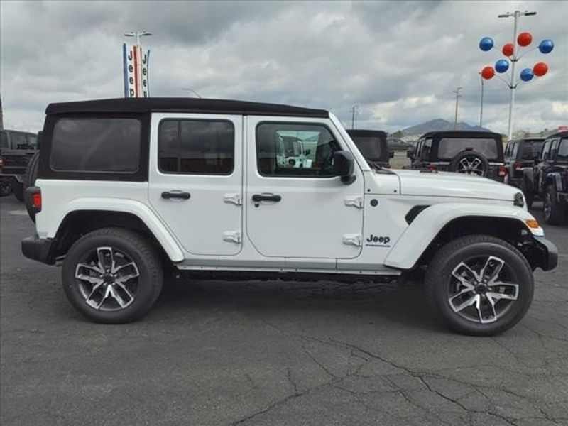 2024 Jeep Wrangler Sport S 4xe in a Bright White Clear Coat exterior color and Blackinterior. Perris Valley Auto Center 951-657-6100 perrisvalleyautocenter.com 