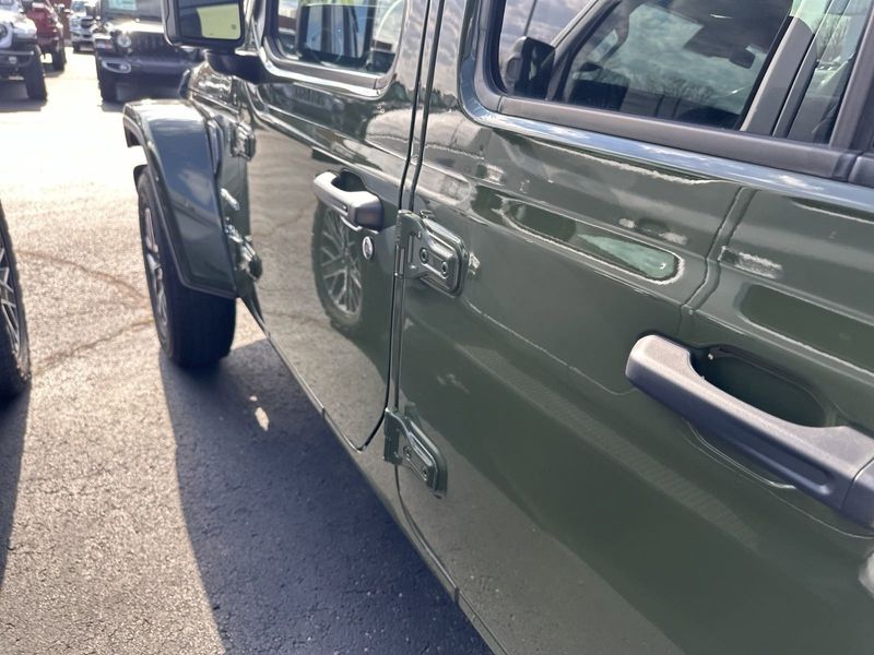 2024 Jeep Wrangler 4-door Sahara in a Sarge Green Clear Coat exterior color and Blackinterior. Gupton Motors Inc 615-384-2886 guptonmotors.com 