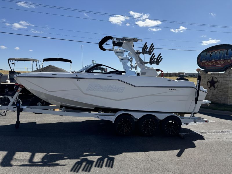 2025 MALIBU MSERIES M230  in a WHITE AND BLUE exterior color. Family PowerSports (877) 886-1997 familypowersports.com 