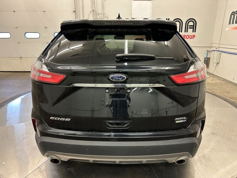 2020 Ford Edge SEL in a Agate Black exterior color and Ebonyinterior. Marina Auto Group (855) 564-8688 marinaautogroup.com 