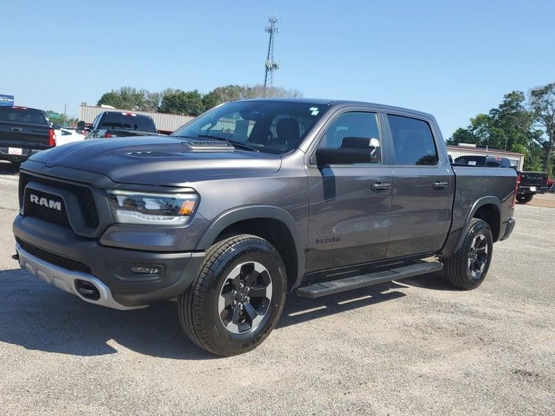 2020 RAM 1500 Rebel in a Granite Crystal Metallic Clear Coat exterior color and Red/Blackinterior. Johnson Dodge 601-693-6343 pixelmotiondemo.com 