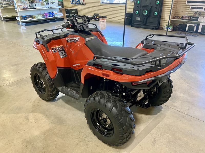 2024 Polaris Sportsman 450 H.O. EPS in a Orange exterior color. Genuine RV & Powersports (936) 569-2523 