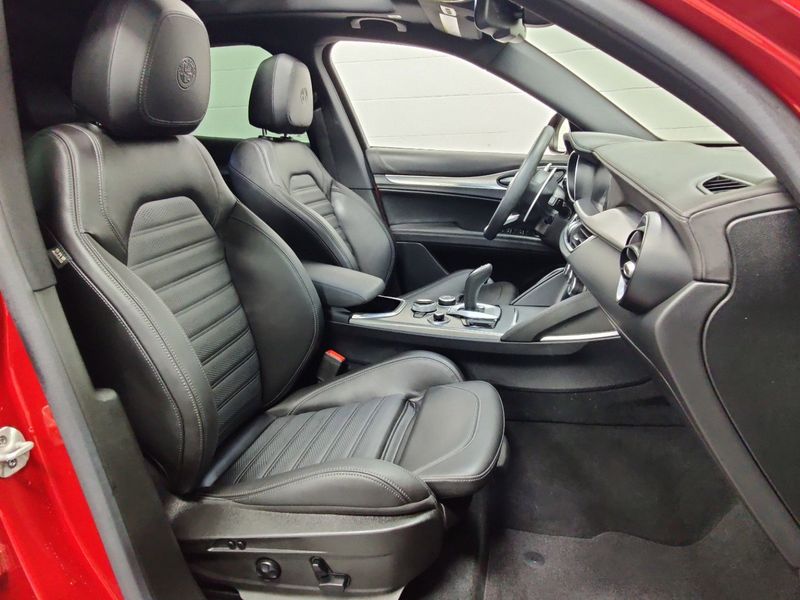 2023 Alfa Romeo Stelvio Veloce Q4 AWD w/Prem & Activ Pkg in a Rosso Etna exterior color and Black Heated Sport Leatherinterior. Schmelz Countryside Alfa Romeo (651) 867-3222 schmelzalfaromeo.com 